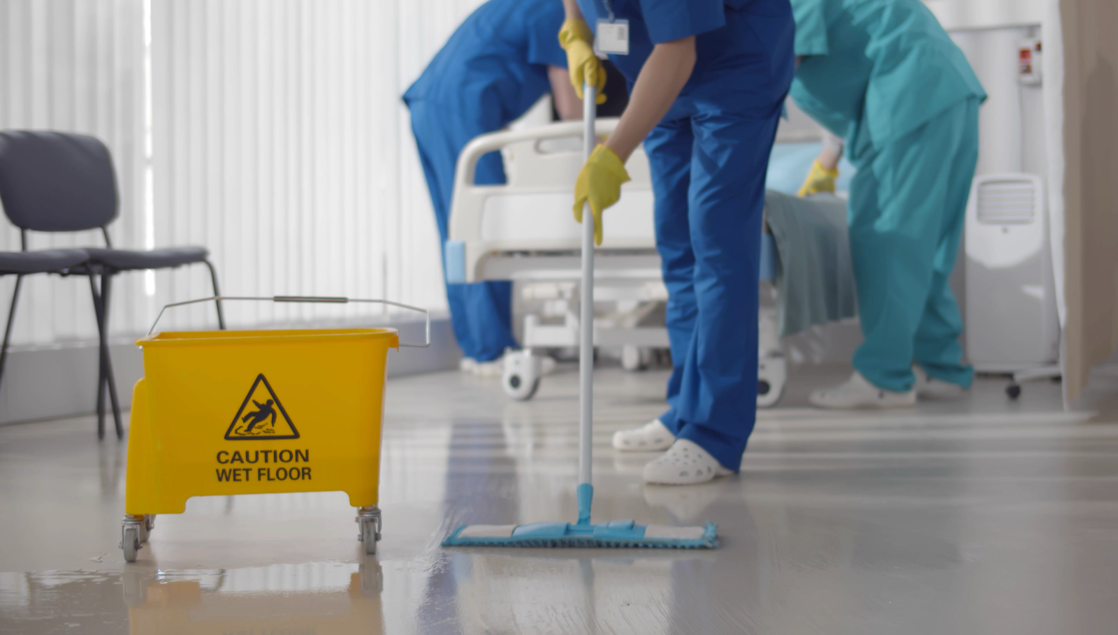Medical office floor being mopped